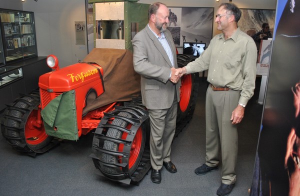 Denis Callesen (left) congratulates John Callesen on the replica Ferguson tractor. 